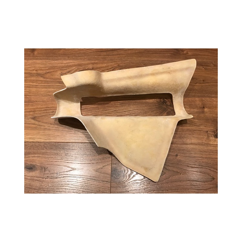 Tapa lateral Montadero derch.